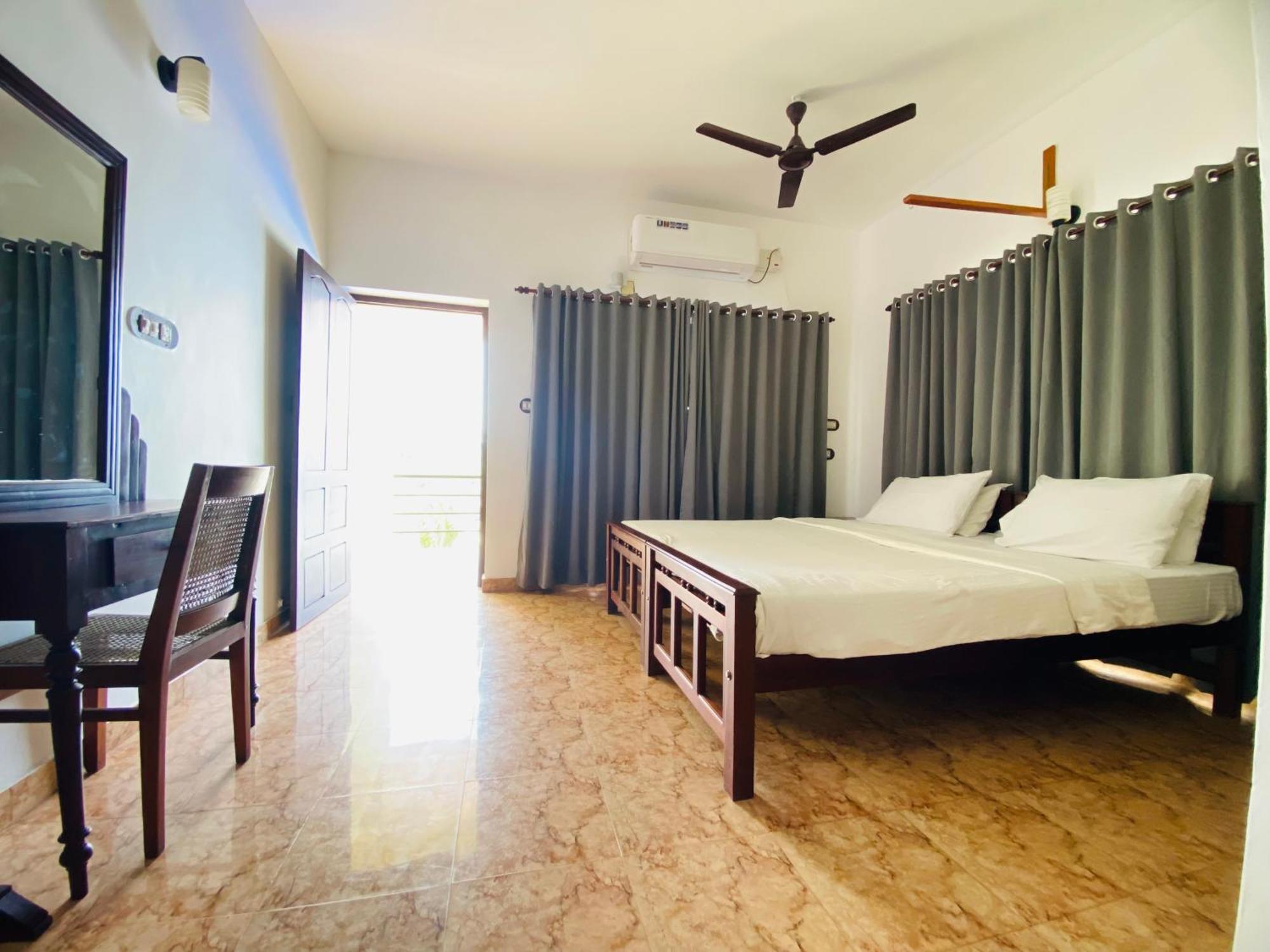 Karma Ayurvedic Beach Resort Kovalam Zimmer foto